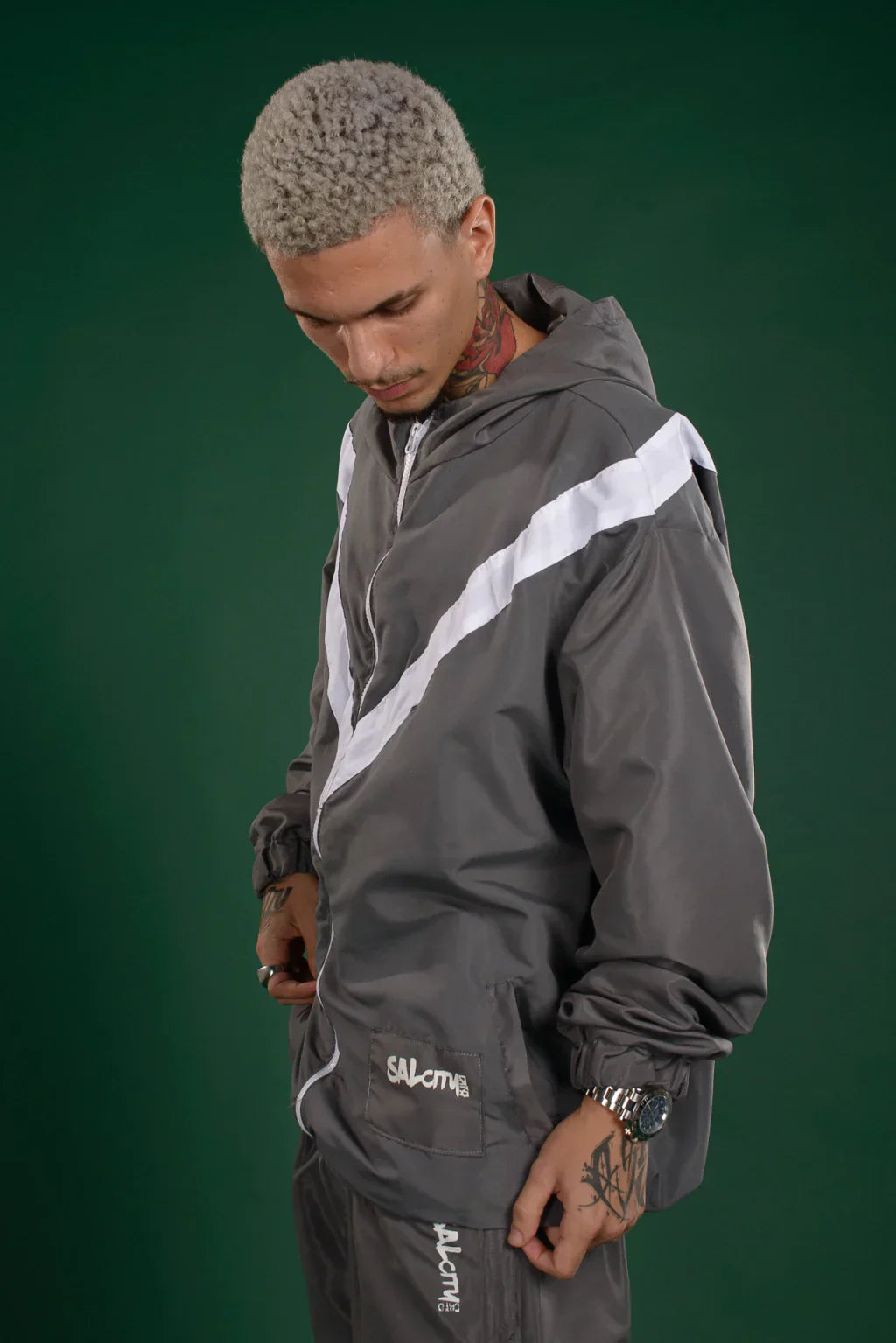 Conjunto corta vento tactel