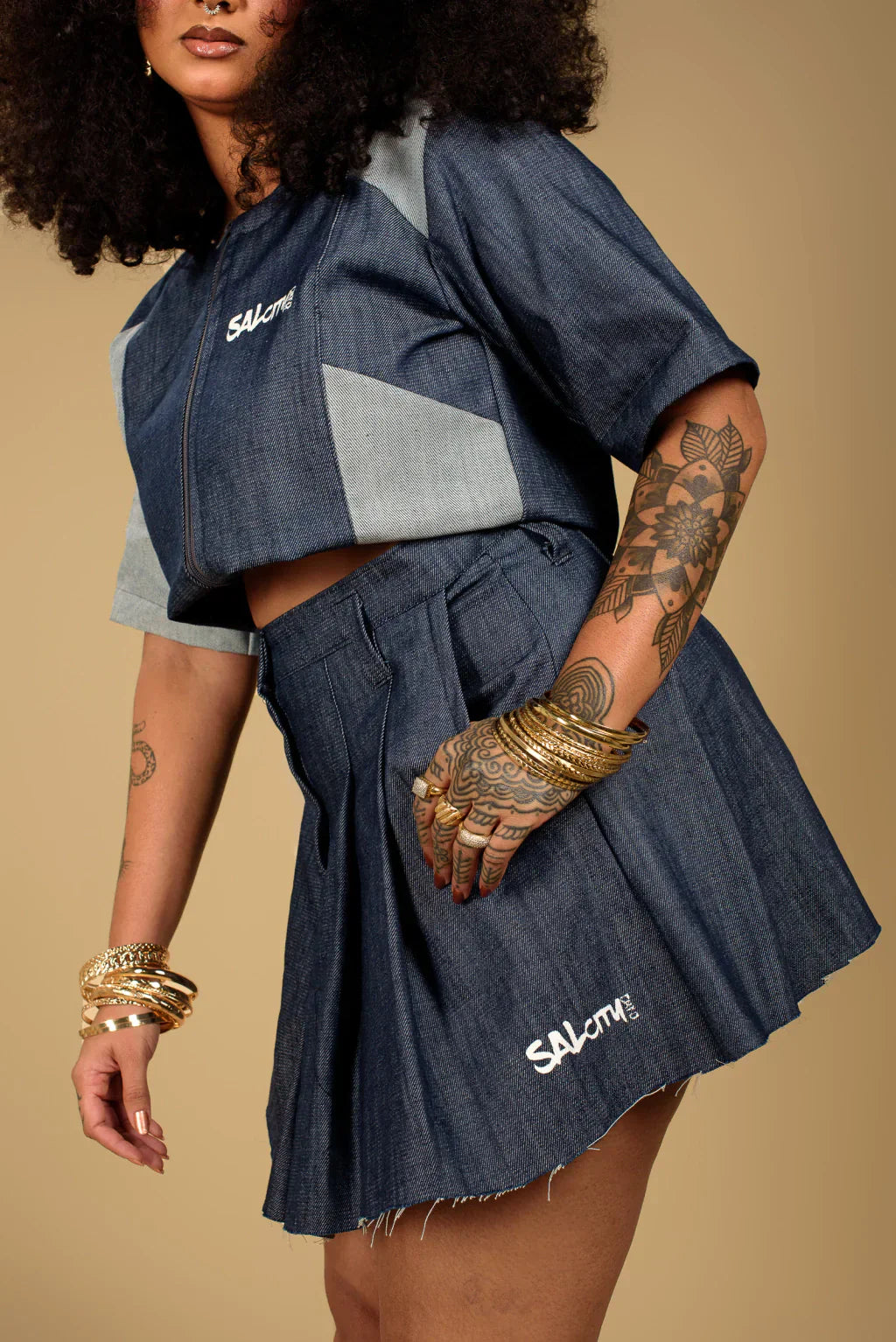 Cropped patchwork com zíper.