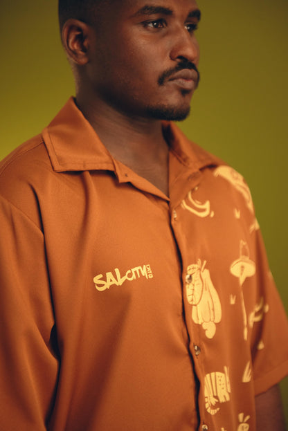 Camisa de botão
